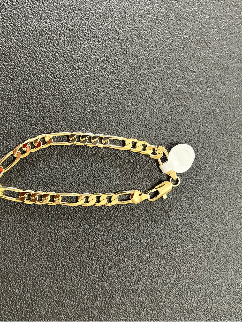 Gold plated Figaro Chain Bracelet with Round Tag